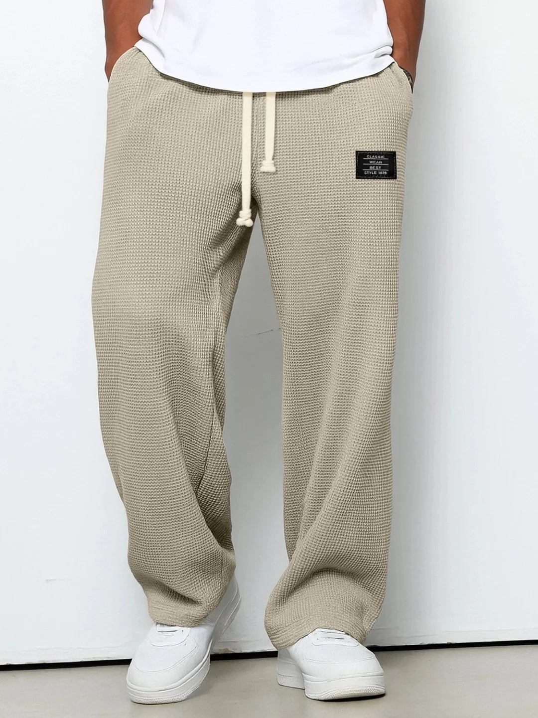 Herren Frühling-Herbst Trendige Marken-Jogginghose mit Lockerem Schnitt und Dehnbarem Geradem Bein Waffelstoff. Micro-Bouncy Sportliche Freizeithose