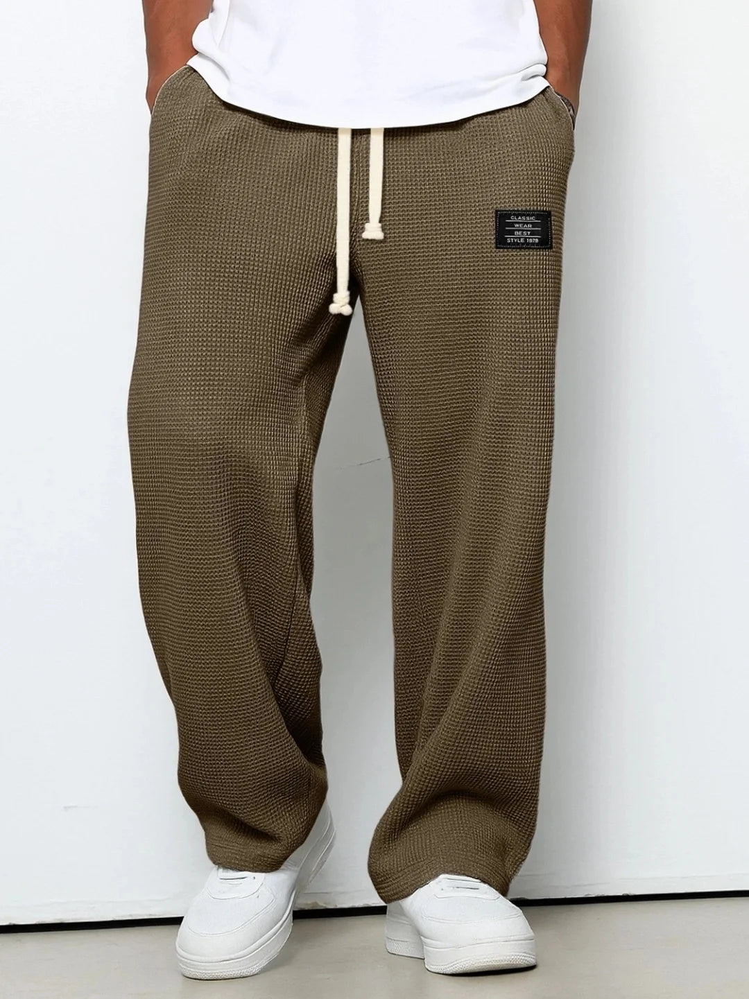 Herren Frühling-Herbst Trendige Marken-Jogginghose mit Lockerem Schnitt und Dehnbarem Geradem Bein Waffelstoff. Micro-Bouncy Sportliche Freizeithose