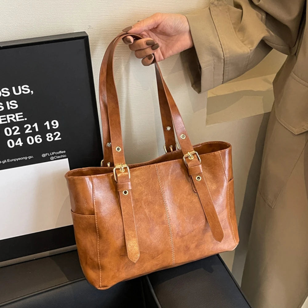 2026 Neue Koreanische Retro PU-Leder Ketten-Schultertaschen Damen Mode Schwarze Große Kapazität Tragetasche Hochwertige Damenhandtaschen
