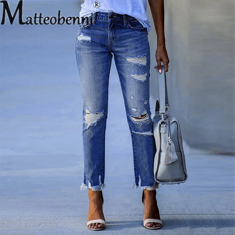 Mode gebrochene Löcher Quaste gerade Jeans Damen Mitte der Taille Knopf Spleißen Jeans hose Damen Trend Streetwear Freizeit hose