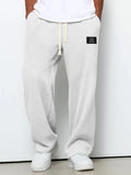 Herren Frühling-Herbst Trendige Marken-Jogginghose mit Lockerem Schnitt und Dehnbarem Geradem Bein Waffelstoff. Micro-Bouncy Sportliche Freizeithose