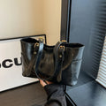 2026 Neue Koreanische Retro PU-Leder Ketten-Schultertaschen Damen Mode Schwarze Große Kapazität Tragetasche Hochwertige Damenhandtaschen