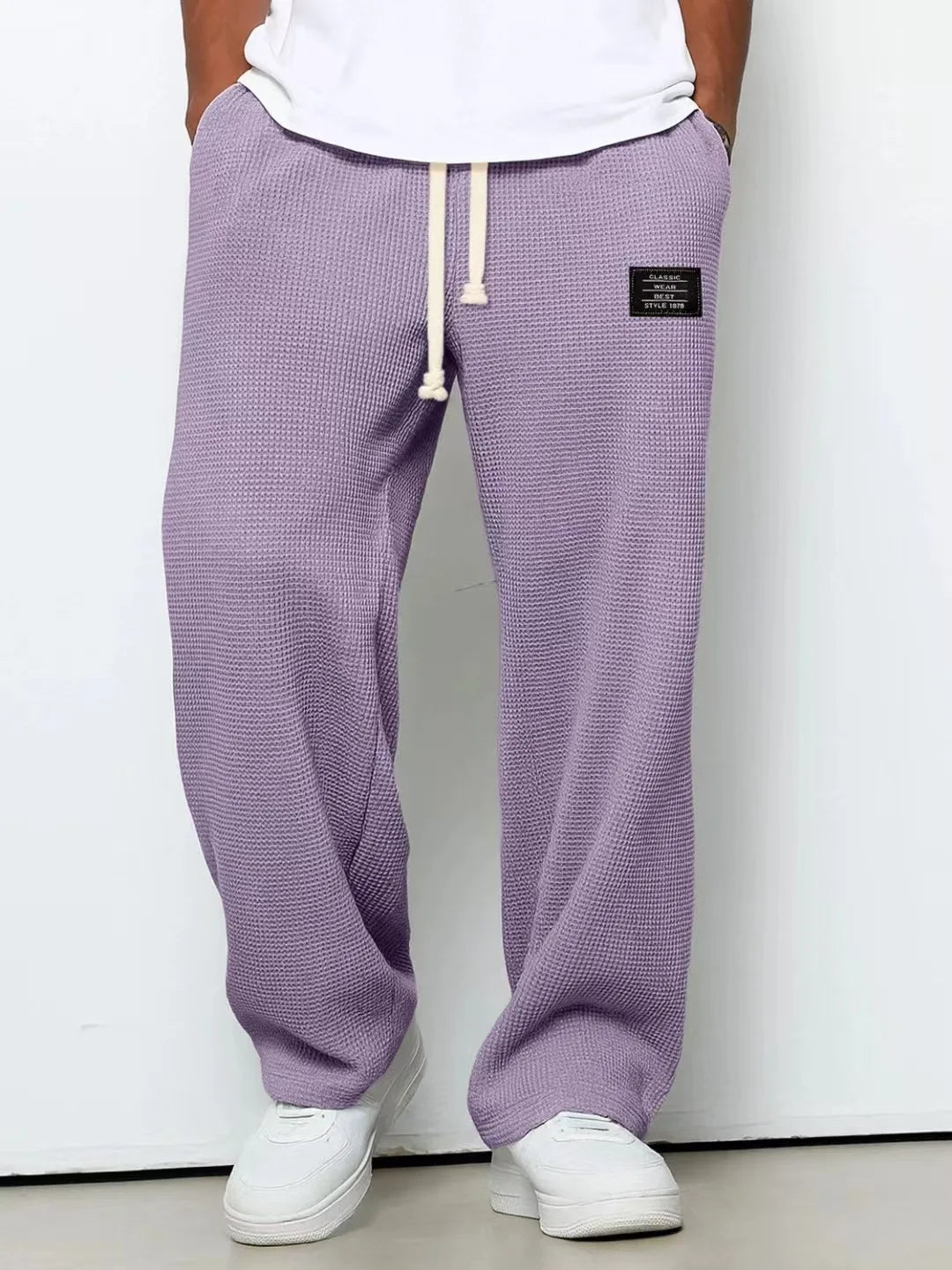 Herren Frühling-Herbst Trendige Marken-Jogginghose mit Lockerem Schnitt und Dehnbarem Geradem Bein Waffelstoff. Micro-Bouncy Sportliche Freizeithose