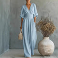 2026 Frühling Damen Jumpsuits mit tiefem V-Ausschnitt, elegante einfarbige High-Waist-Rompers, lässige Weite-Bein-Hosen mit Taschen, Overall für den Urlaub