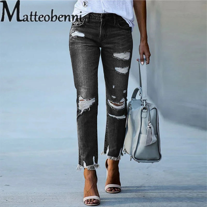 Mode gebrochene Löcher Quaste gerade Jeans Damen Mitte der Taille Knopf Spleißen Jeans hose Damen Trend Streetwear Freizeit hose