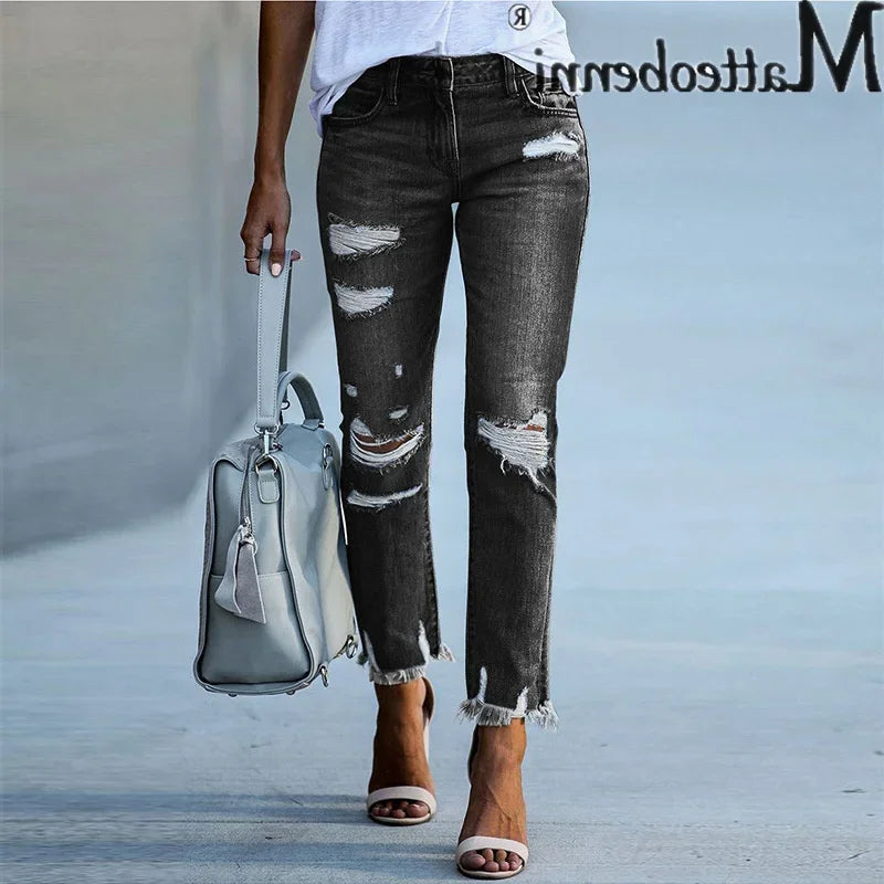 Mode gebrochene Löcher Quaste gerade Jeans Damen Mitte der Taille Knopf Spleißen Jeans hose Damen Trend Streetwear Freizeit hose
