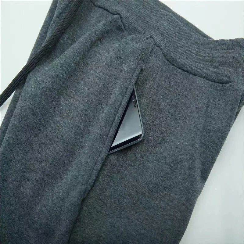 Herren Herbst- und Winter-Trendhosen, Jogginghosen, elastische Sport-Freizeithosen mit elastischem Bund, lockere Fitness-Sweatpants.