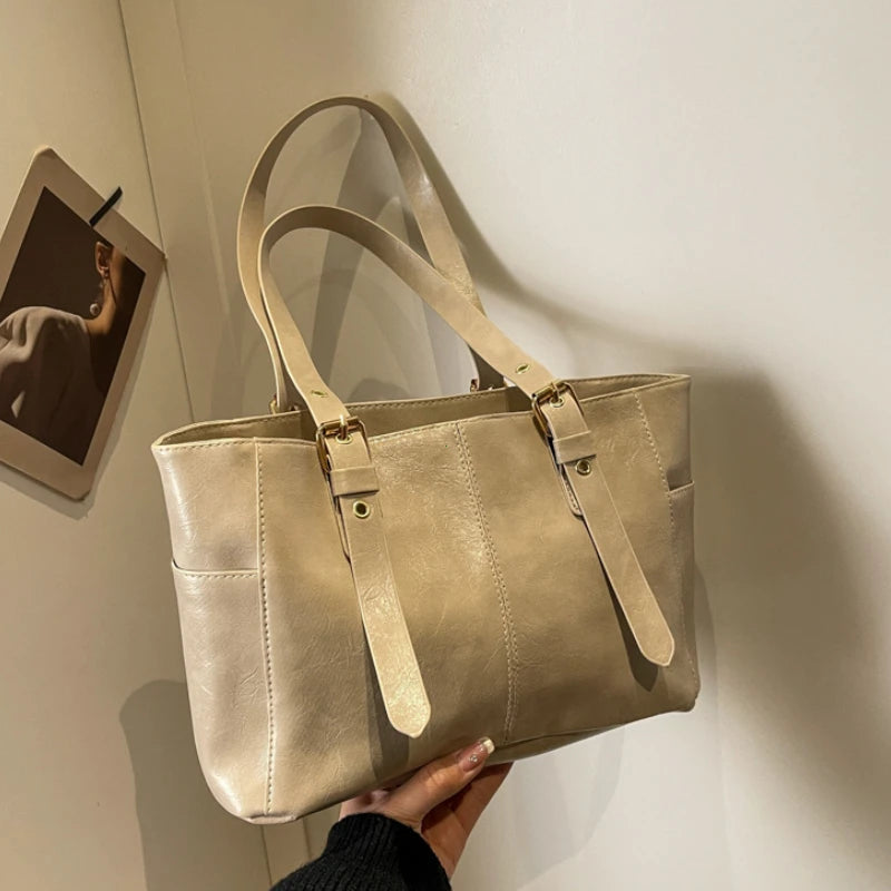 2026 Neue Koreanische Retro PU-Leder Ketten-Schultertaschen Damen Mode Schwarze Große Kapazität Tragetasche Hochwertige Damenhandtaschen