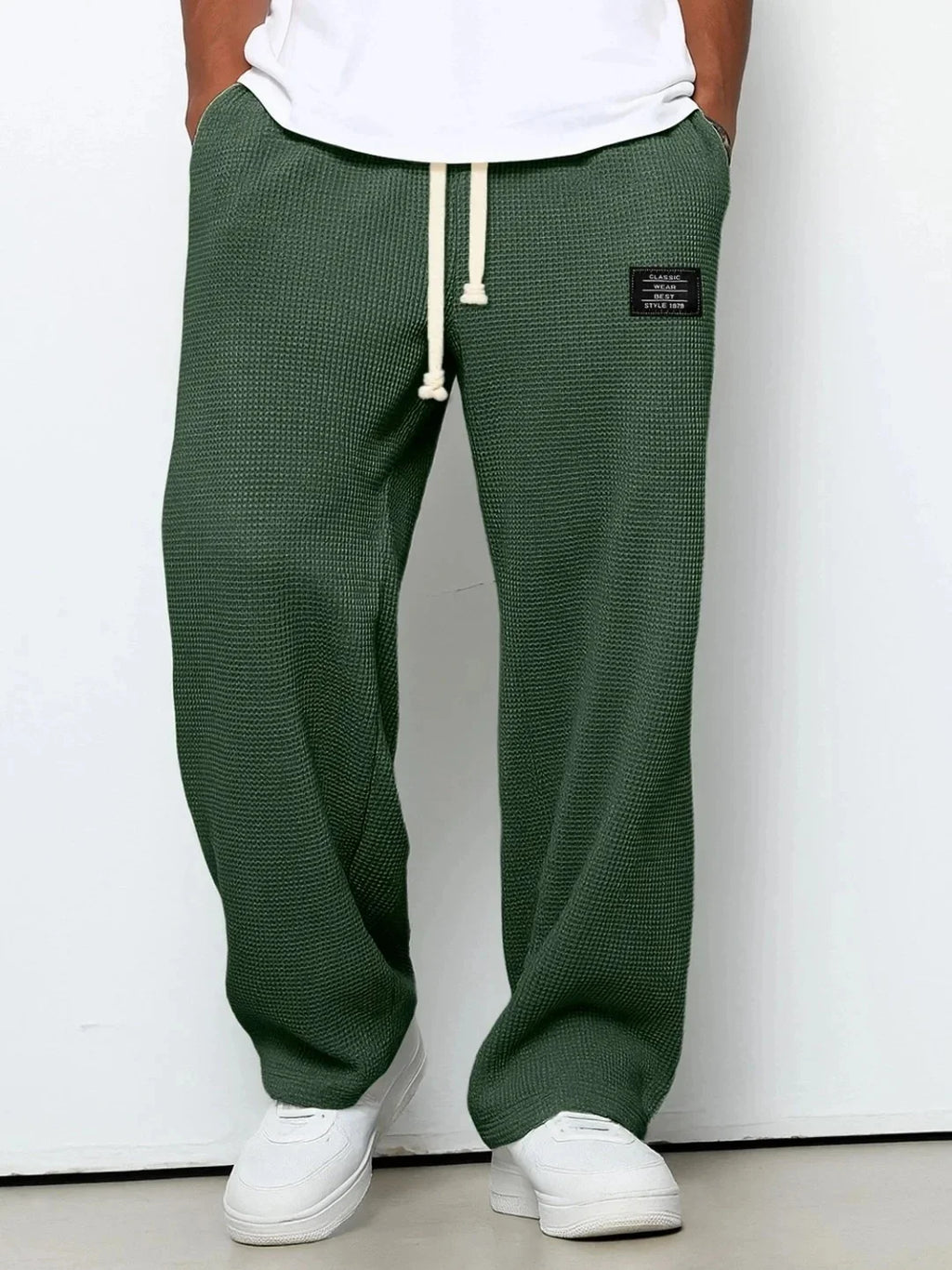 Herren Frühling-Herbst Trendige Marken-Jogginghose mit Lockerem Schnitt und Dehnbarem Geradem Bein Waffelstoff. Micro-Bouncy Sportliche Freizeithose