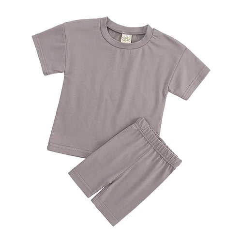 Neuheit Kleine Kinder Baby Mädchen Kleidung 2 Stück Trainingsanzug Set Übergroßen Kurzarm Baumwolle T-shirt + Leggins Shorts Sport Anzug
