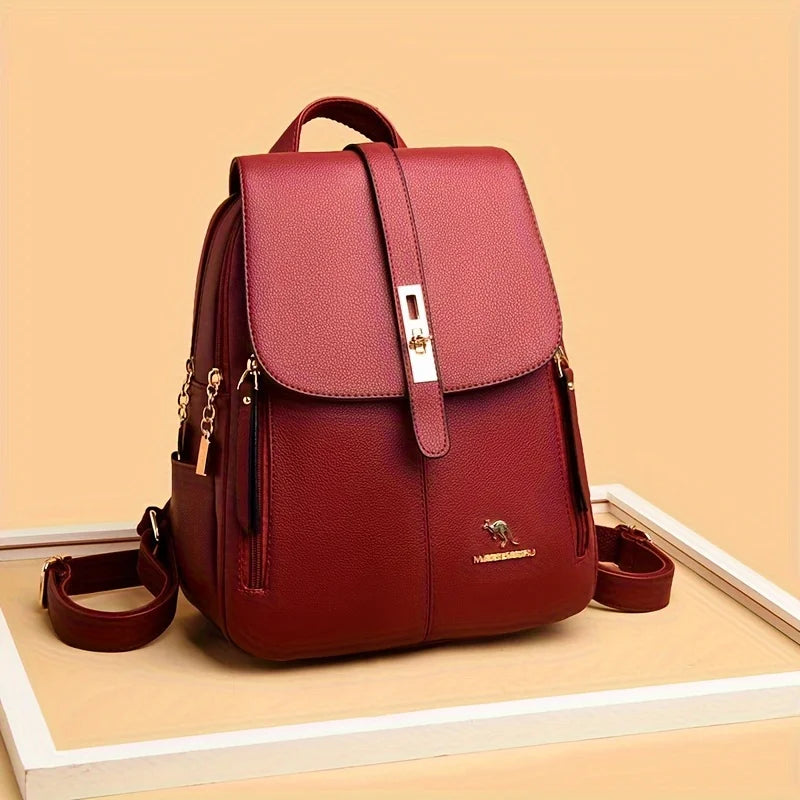 Eleganter weinroter Lederrucksack für Damen, diebstahlsicherer Tagesrucksack mit mehreren Taschen und Logo, stilvolle Reise- und Alltags-Umhängetasche