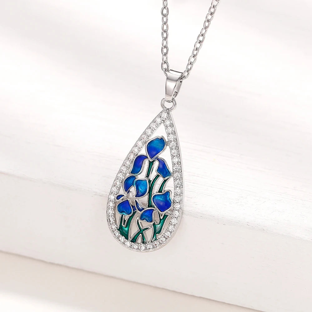 Huitan Elegante birnenförmige Damen-Anhänger-Halskette, blaue Blume, ästhetisches Hochzeits- und Party-Accessoire, eingelegter glänzender CZ, trendiger Schmuck