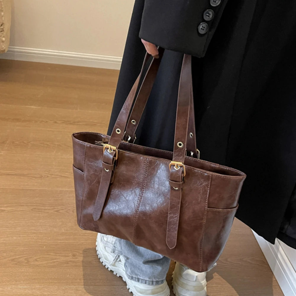 2026 Neue Koreanische Retro PU-Leder Ketten-Schultertaschen Damen Mode Schwarze Große Kapazität Tragetasche Hochwertige Damenhandtaschen