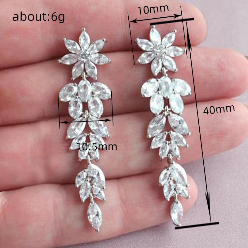 Huitan Ästhetische Blumen-Ohrringe, lange Hängeohrringe für Frauen, wunderschöne Hochzeitsaccessoires mit brillantem kubischem Zirkon, trendiger Schmuck
