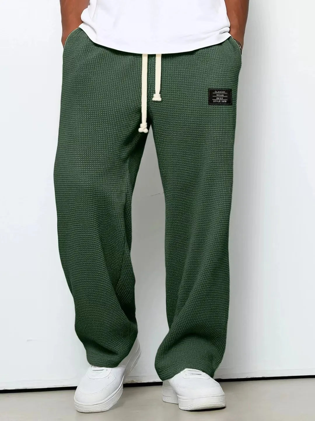 Herren Frühling-Herbst Trendige Marken-Jogginghose mit Lockerem Schnitt und Dehnbarem Geradem Bein Waffelstoff. Micro-Bouncy Sportliche Freizeithose