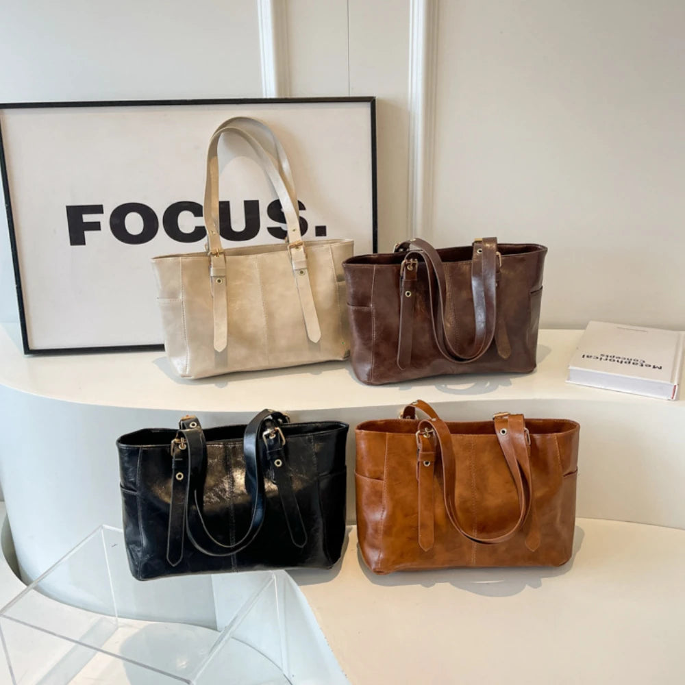 2026 Neue Koreanische Retro PU-Leder Ketten-Schultertaschen Damen Mode Schwarze Große Kapazität Tragetasche Hochwertige Damenhandtaschen